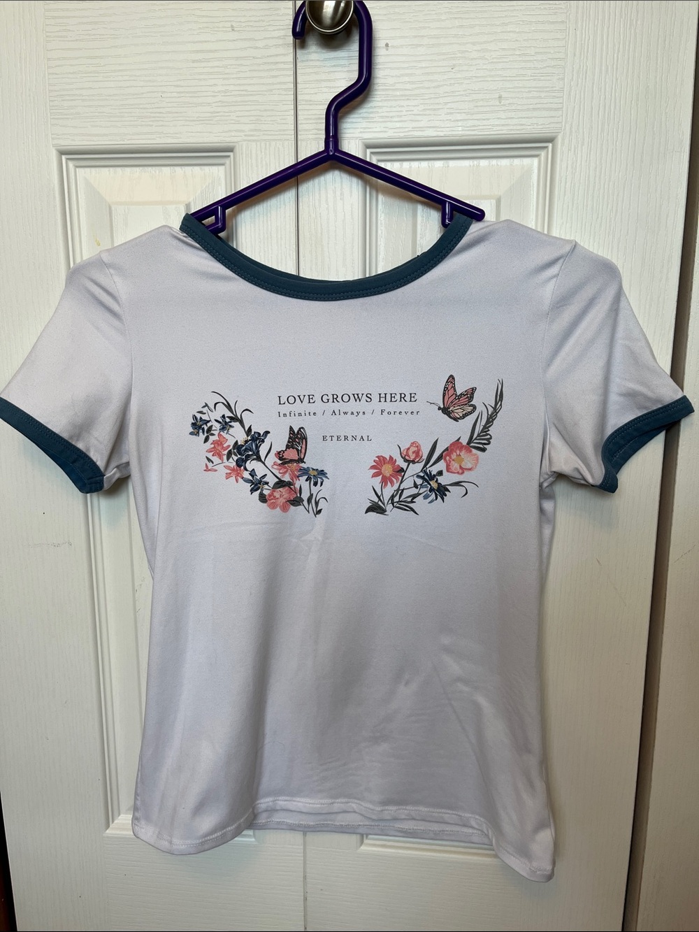 Ardene White Tee with Teal Trim and Floral Butterfly Graphic